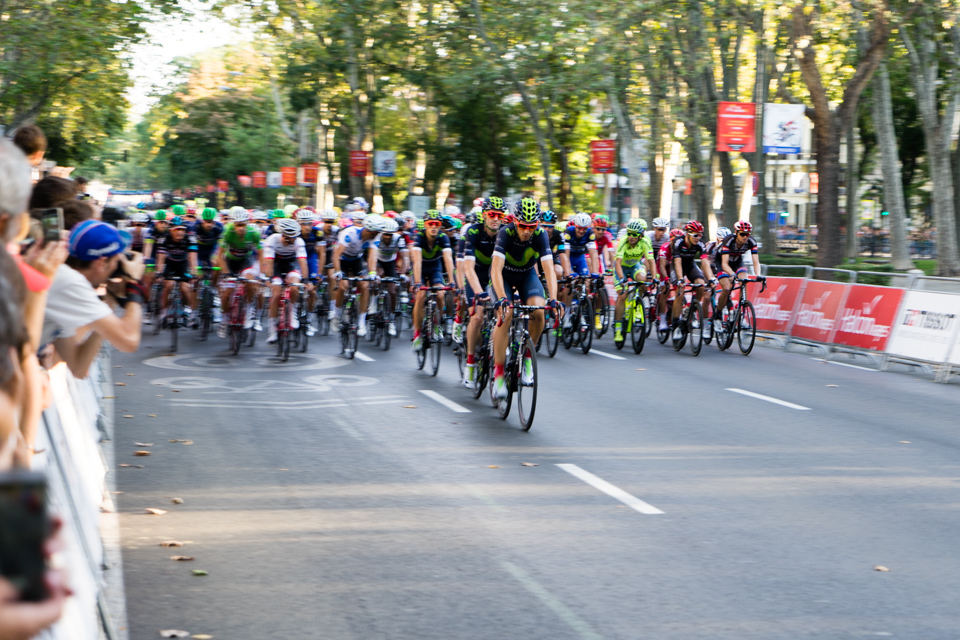 Peloton running it's first lap on Paseo del Prado (Madrid)